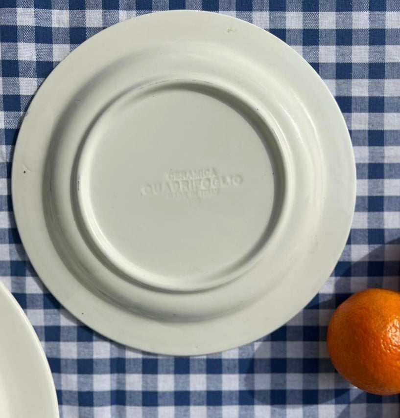 8 assiettes à dessert et un plat rond décor fruits